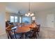 Bright dining room with seating for six at 6202 E Mckellips Rd # 83, Mesa, AZ 85215