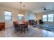 Dining area with a chandelier and access to the kitchen at 6202 E Mckellips Rd # 83, Mesa, AZ 85215