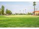 Expansive green grass golf course at 6202 E Mckellips Rd # 83, Mesa, AZ 85215