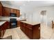 Spacious kitchen with a large island, granite countertops, and stainless steel appliances at 6202 E Mckellips Rd # 83, Mesa, AZ 85215