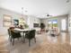 An open-concept living and dining space filled with modern furniture and natural light at 6202 E Mckellips Rd # 83, Mesa, AZ 85215