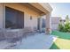 Relaxing covered patio with seating and a view of the backyard at 6202 E Mckellips Rd # 83, Mesa, AZ 85215