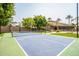 Community pickleball court with basketball court in the background at 6202 E Mckellips Rd # 83, Mesa, AZ 85215