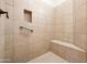 Tiled shower with a built-in seat and niche at 6202 E Mckellips Rd # 83, Mesa, AZ 85215