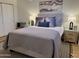 Serene bedroom featuring a plush bed, ample light, and tasteful decor at 6540 N 7Th Ave # 49, Phoenix, AZ 85013