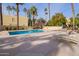 Relaxing pool area with lounge chairs and patio furniture at 6540 N 7Th Ave # 49, Phoenix, AZ 85013