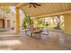 Covered patio with picnic table and ceiling fan at 6540 N 7Th Ave # 49, Phoenix, AZ 85013