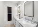 Double vanity bathroom with modern fixtures and marble countertops at 6644 E Cholla Dr, Paradise Valley, AZ 85253