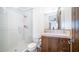 Bathroom with shower and wood vanity at 7701 E Golden Eagle E Cir, Gold Canyon, AZ 85118