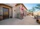 Welcoming entryway with a solid wood door and stone accents at 7701 E Golden Eagle E Cir, Gold Canyon, AZ 85118