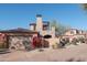 Two-story home with stucco exterior, tile roof, and a large attached garage at 7701 E Golden Eagle E Cir, Gold Canyon, AZ 85118