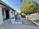 Inviting front patio with rocking chairs and a view of the street at 7950 E Keats Ave # 170, Mesa, AZ 85209