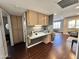 Kitchen with built-in desk and ample cabinet storage at 7950 E Keats Ave # 170, Mesa, AZ 85209