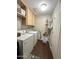 Bright laundry room with washer, dryer, and ample storage at 7950 E Keats Ave # 170, Mesa, AZ 85209