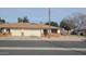 Tan two-unit building with two-car garages and desert landscaping at 8020 E Keats Ave # 314, Mesa, AZ 85209