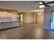 Open living area with wood-look floors and sliding door access to patio at 8020 E Keats Ave # 314, Mesa, AZ 85209