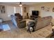 Spacious living room with large TV and comfortable seating at 8020 E Keats Ave # 314, Mesa, AZ 85209