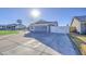 House exterior with artificial turf, fountain, and basketball hoop at 8021 W Charter Oak Rd, Peoria, AZ 85381