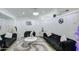 Living room with modern furniture and a white and gray color scheme at 8021 W Charter Oak Rd, Peoria, AZ 85381