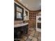 Unique bathroom with a decorative tile backsplash and niche at 8408 E La Senda Dr, Scottsdale, AZ 85255