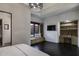 Main bedroom with built-in window seat, desk, and dark hardwood floors at 8408 E La Senda Dr, Scottsdale, AZ 85255