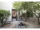 Private courtyard with fountain and lush landscaping at 8408 E La Senda Dr, Scottsdale, AZ 85255