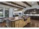 Spacious kitchen with a large island and copper farm sink at 8408 E La Senda Dr, Scottsdale, AZ 85255