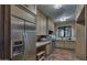 Laundry room with modern appliances and ample cabinetry at 8408 E La Senda Dr, Scottsdale, AZ 85255