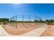 Well-maintained baseball field with backstop and dugouts at 904 E Zesta Ln, Gilbert, AZ 85297