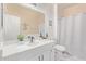 Well-lit bathroom featuring a white vanity and shower/tub combo at 904 E Zesta Ln, Gilbert, AZ 85297