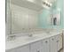 Bathroom with double vanity and large mirror at 904 E Zesta Ln, Gilbert, AZ 85297