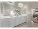 Elegant bathroom boasting double sinks and marble countertops at 904 E Zesta Ln, Gilbert, AZ 85297