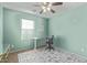 Bedroom with desk, chair, and window with blinds at 904 E Zesta Ln, Gilbert, AZ 85297