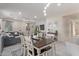 Kitchen and dining area with an island and table for six at 904 E Zesta Ln, Gilbert, AZ 85297