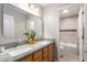 Double vanity bathroom with granite countertops at 917 E Betsy Ln, Gilbert, AZ 85296