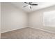 Bright bedroom with ceiling fan and large closet at 917 E Betsy Ln, Gilbert, AZ 85296