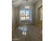 Bright dining room with large window and elegant chandelier at 917 E Betsy Ln, Gilbert, AZ 85296