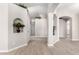 Bright entryway with tile floors and arched niches at 917 E Betsy Ln, Gilbert, AZ 85296