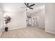 Living room with tile floors and view to kitchen at 917 E Betsy Ln, Gilbert, AZ 85296