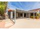 Covered patio with ceiling fan and access to backyard at 917 E Betsy Ln, Gilbert, AZ 85296