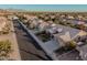 Aerial view of a residential street with houses and desert landscaping at 9345 E Hobart St, Mesa, AZ 85207