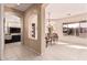 Formal dining room with chandelier and view to kitchen at 9345 E Hobart St, Mesa, AZ 85207