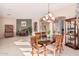 Bright dining room with hardwood floors and built-ins at 9345 E Hobart St, Mesa, AZ 85207