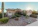 Charming house with drought-tolerant landscaping and a two-car garage at 9345 E Hobart St, Mesa, AZ 85207