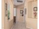 Bright hallway with decorative niches and tile floors at 9345 E Hobart St, Mesa, AZ 85207