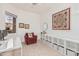 Bright home office features built-in shelving and window views at 9345 E Hobart St, Mesa, AZ 85207