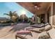 Relaxing patio with lounge chairs and a view of the sparkling pool at 9345 E Hobart St, Mesa, AZ 85207