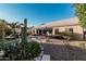 Inviting pool area with a patio table and chairs, ideal for summer fun at 9345 E Hobart St, Mesa, AZ 85207