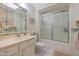 Bathroom with shower/tub combo and updated vanity at 9719 W Pineridge Dr, Sun City, AZ 85351