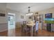 Dining room with a wooden table and hutch at 9719 W Pineridge Dr, Sun City, AZ 85351